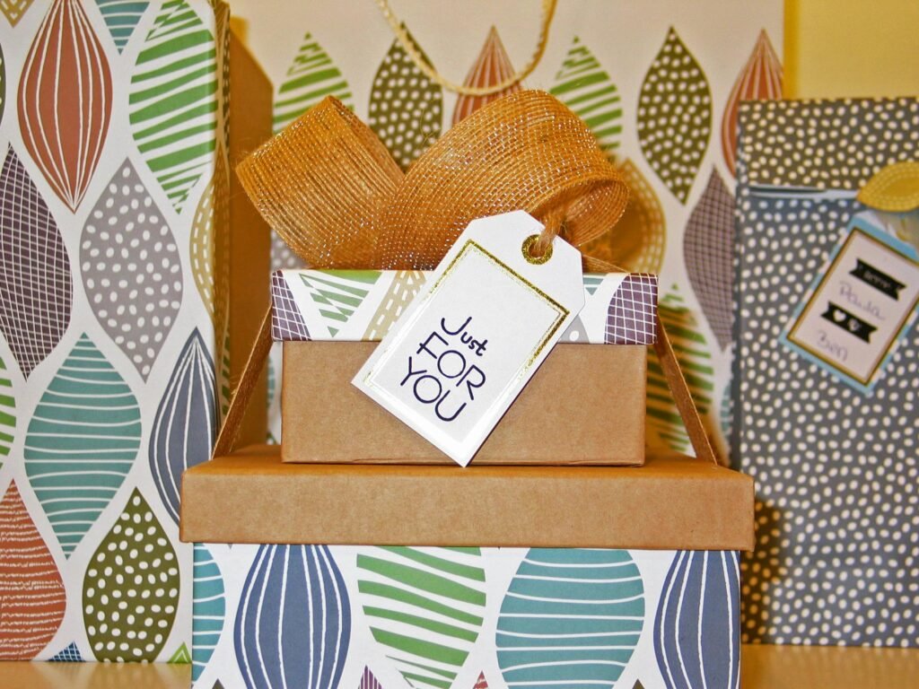 Close-up Photo of Gift Boxes with Greeting Card